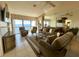 Bright living room with water views and comfy seating at 4620 Bay Blvd # 1158, Port Richey, FL 34668