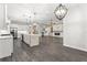 Expansive open living area connecting the kitchen, living room, and dining spaces at 4801 Majestic Hills Loop, Brooksville, FL 34601