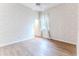 Bedroom with wood floors and a ceiling fan at 5083 Carnation Ct, Spring Hill, FL 34607