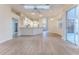 Kitchen with breakfast bar and view into living room at 5083 Carnation Ct, Spring Hill, FL 34607