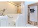 Bathroom walk-in tub with tiled walls and a shower wand at 5286 Hamlet Cir, Spring Hill, FL 34606