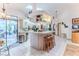 Bright kitchen with ample countertop space and an open layout to the patio at 5286 Hamlet Cir, Spring Hill, FL 34606