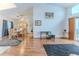 Spacious living room with vaulted ceilings and dining area in the background at 5286 Hamlet Cir, Spring Hill, FL 34606