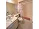Clean bathroom with tub and shower, toilet and sink at 5434 Chad Pl # 20, New Port Richey, FL 34652