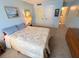 Spacious bedroom with a queen bed and ample closet space at 5434 Chad Pl # 20, New Port Richey, FL 34652