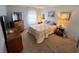 Bright bedroom with a queen-size bed and plenty of natural light at 5434 Chad Pl # 20, New Port Richey, FL 34652