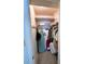 Well-organized closet with shelves and rods for hanging clothes at 5434 Chad Pl # 20, New Port Richey, FL 34652