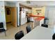 Community kitchen with appliances and ample counter space at 5434 Chad Pl # 20, New Port Richey, FL 34652