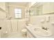 Bathroom with walk-in shower and vanity at 6020 Wilds Dr # 4B, New Port Richey, FL 34653