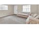 Spacious living room with plush sofas and neutral carpeting at 6033 Wilds Dr # B07, New Port Richey, FL 34653