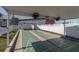 Community shuffleboard courts under covered area at 6033 Wilds Dr # B07, New Port Richey, FL 34653