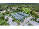 Aerial view of community tennis courts with ample parking at 6663 Water Oak Ct, Spring Hill, FL 34606