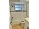 Clean bathroom with updated fixtures and flooring at 7207 Nova Scotia Dr, Port Richey, FL 34668