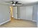 Bright bedroom with ceiling fan, closet, and access to bathroom at 7207 Nova Scotia Dr, Port Richey, FL 34668