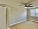 Bright bedroom with ceiling fan and wood-look floors at 7207 Nova Scotia Dr, Port Richey, FL 34668