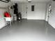Clean and spacious garage with epoxy flooring at 7207 Nova Scotia Dr, Port Richey, FL 34668