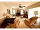 Living room with neutral decor, comfortable seating and lots of natural light at 8111 Merrimac Dr, Port Richey, FL 34668
