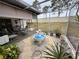 Relaxing screened patio with fountain and seating area at 8111 Merrimac Dr, Port Richey, FL 34668