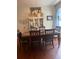 Dining room with wooden table and hutch at 8129 Ambersweet Pl, Land O Lakes, FL 34637