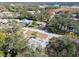 Aerial view of residential neighborhood near lake at 8446 Braganza St, Spring Hill, FL 34608