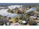 High-angle view of the home and the surrounding neighborhood at 8446 Braganza St, Spring Hill, FL 34608