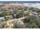 Aerial view of residential neighborhood near lake at 8446 Braganza St, Spring Hill, FL 34608