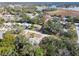 Aerial view of residential neighborhood near lake at 8446 Braganza St, Spring Hill, FL 34608