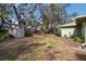 Private backyard with storage shed and mature trees at 8446 Braganza St, Spring Hill, FL 34608