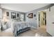 Bright bedroom with a queen-size bed and ample closet space at 8446 Braganza St, Spring Hill, FL 34608