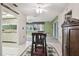 Bright dining area with view into living room and kitchen at 8446 Braganza St, Spring Hill, FL 34608