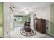 Small dining area with a wooden cabinet and a circular rug at 8446 Braganza St, Spring Hill, FL 34608