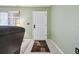 Front entryway with a white door and tile flooring at 8446 Braganza St, Spring Hill, FL 34608