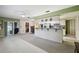 Open kitchen features a breakfast bar and stainless steel appliances at 8446 Braganza St, Spring Hill, FL 34608