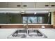 Double sink with window overlooking backyard at 8446 Braganza St, Spring Hill, FL 34608