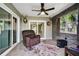 Spacious sunroom with a comfortable seating area and views of the backyard at 8446 Braganza St, Spring Hill, FL 34608