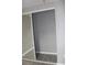 Mirrored sliding doors and organized closet shelving at 8703 Robilina Rd, Port Richey, FL 34668