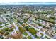 Wide aerial view of neighborhood, showing surrounding houses and streets at 8809 Shoemaker Ln, Hudson, FL 34667