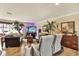 Relaxing living room featuring ample seating and large-screen TV at 8809 Shoemaker Ln, Hudson, FL 34667