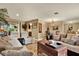 Open living space with comfortable seating and views into the dining area at 8809 Shoemaker Ln, Hudson, FL 34667