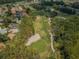 Aerial view of community golf course and homes at 9338 Clearmeadow Ln, New Port Richey, FL 34655