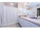 Clean bathroom with double sinks and shower at 9338 Clearmeadow Ln, New Port Richey, FL 34655
