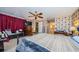 Spacious Primary bedroom with a view and large dresser at 9338 Clearmeadow Ln, New Port Richey, FL 34655