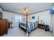 Guest bedroom with nautical themed decor and double bed at 9338 Clearmeadow Ln, New Port Richey, FL 34655