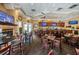 Relaxing clubhouse bar with fireplace and TVs at 9338 Clearmeadow Ln, New Port Richey, FL 34655