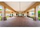 Elegant clubhouse entrance with brick walkway at 9338 Clearmeadow Ln, New Port Richey, FL 34655
