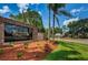 Timber Greens community entrance with brick pillars and signage at 9338 Clearmeadow Ln, New Port Richey, FL 34655