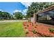 Timber Greens community entrance with landscaping and signage at 9338 Clearmeadow Ln, New Port Richey, FL 34655