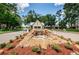 Gated community guard house with a waterfall feature at 9338 Clearmeadow Ln, New Port Richey, FL 34655