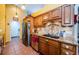 Modern kitchen with granite countertops, stainless steel appliances, and ample cabinet space at 9338 Clearmeadow Ln, New Port Richey, FL 34655