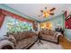Bright living room with view of a pond/canal at 9338 Clearmeadow Ln, New Port Richey, FL 34655